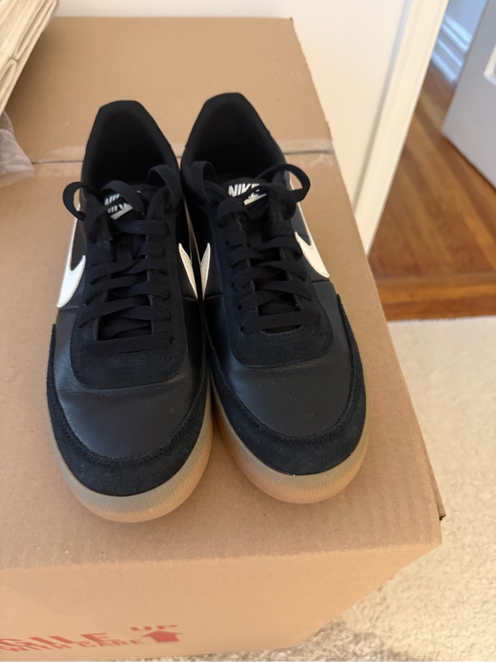 Nike Men’s Black Sneakers with White Swoosh and Gum Sole